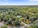 Aerial view of house showing driveway and surroundings at 1908 S Farm Rd, Deland, FL 32720