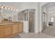 Main bathroom with shower, vanity, and view to bedroom at 1908 S Farm Rd, Deland, FL 32720