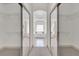 Elegant bathroom with a large bathtub and walk-in closets at 1908 S Farm Rd, Deland, FL 32720