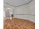 Bright and spacious entryway with tile flooring and views to the dining area at 1908 S Farm Rd, Deland, FL 32720