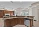 Kitchen with stainless steel appliances and granite countertops at 1908 S Farm Rd, Deland, FL 32720