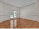 Sunlit office space with French doors leading outside at 1908 S Farm Rd, Deland, FL 32720