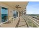Spacious balcony with ocean view and ceiling fan at 1925 S Atlantic Ave # 703, Daytona Beach, FL 32118