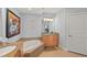 Spa-like bathroom with double vanity, soaking tub, and tile floors at 1925 S Atlantic Ave # 703, Daytona Beach, FL 32118