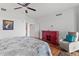 Bright bedroom with hardwood floors and built-in storage at 1925 S Atlantic Ave # 703, Daytona Beach, FL 32118