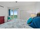 Spacious bedroom with balcony access and views at 1925 S Atlantic Ave # 703, Daytona Beach, FL 32118