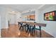 Dining area with rustic table and kitchen access at 1925 S Atlantic Ave # 703, Daytona Beach, FL 32118