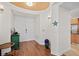 Entryway with hardwood floors and coastal decor at 1925 S Atlantic Ave # 703, Daytona Beach, FL 32118