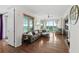 Bright living room with hardwood floors and city views at 1925 S Atlantic Ave # 703, Daytona Beach, FL 32118