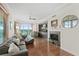 Living room boasts hardwood floors and fireplace at 1925 S Atlantic Ave # 703, Daytona Beach, FL 32118