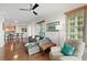 Bright living room featuring hardwood floors and ample seating at 1925 S Atlantic Ave # 703, Daytona Beach, FL 32118