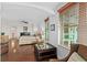 Main bedroom with hardwood floors and ample natural light at 1925 S Atlantic Ave # 703, Daytona Beach, FL 32118