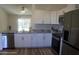 Modern kitchen with stainless steel appliances and granite countertops at 222 Oak Branch Dr, Edgewater, FL 32141