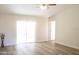 Bright living room with sliding glass doors leading to patio at 222 Oak Branch Dr, Edgewater, FL 32141
