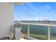 Relaxing balcony with wicker chairs and waterfront views at 231 Riverside Dr # 1001, Holly Hill, FL 32117