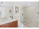 Clean bathroom with a walk-in shower, toilet and modern vanity at 231 Riverside Dr # 1001, Holly Hill, FL 32117