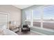 Bedroom with water views and white shutters at 231 Riverside Dr # 1001, Holly Hill, FL 32117