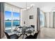 Dining area with bay views, seating for four at 231 Riverside Dr # 1001, Holly Hill, FL 32117