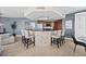 Modern kitchen with an island and bar stools, stainless steel appliances at 231 Riverside Dr # 1001, Holly Hill, FL 32117