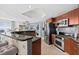 Modern kitchen with stainless steel appliances at 231 Riverside Dr # 1001, Holly Hill, FL 32117