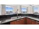 Kitchen with granite countertops and sink at 231 Riverside Dr # 1001, Holly Hill, FL 32117