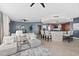 Open living space with kitchen island, comfortable seating and water views at 231 Riverside Dr # 1001, Holly Hill, FL 32117