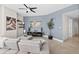 Spacious living room with a modern fireplace and comfy seating at 231 Riverside Dr # 1001, Holly Hill, FL 32117