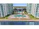 Resort-style pool with plenty of lounge chairs at 231 Riverside Dr # 1001, Holly Hill, FL 32117