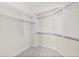 Large walk-in closet with double hanging rods and shelves at 231 Riverside Dr # 1001, Holly Hill, FL 32117