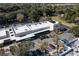 Aerial view of plaza shopping center with ample parking at 235 Pine Cone Trl, Ormond Beach, FL 32174