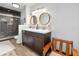 Bathroom with double vanity and walk-in shower at 235 Pine Cone Trl, Ormond Beach, FL 32174