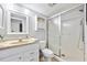 Simple bathroom with a white vanity, toilet and shower at 235 Pine Cone Trl, Ormond Beach, FL 32174