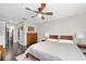 Spacious bedroom with dark hardwood floors and ceiling fan at 235 Pine Cone Trl, Ormond Beach, FL 32174