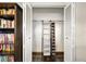 Organized closet with hanging rods and shelf dividers at 235 Pine Cone Trl, Ormond Beach, FL 32174
