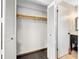 Large closet with wood shelving and bi-fold doors at 235 Pine Cone Trl, Ormond Beach, FL 32174