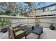 Private patio with seating area, perfect for outdoor dining at 235 Pine Cone Trl, Ormond Beach, FL 32174