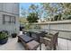 Outdoor patio with seating and a grill, great for entertaining at 235 Pine Cone Trl, Ormond Beach, FL 32174