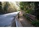 Scenic walking path alongside a tranquil waterway at 235 Pine Cone Trl, Ormond Beach, FL 32174