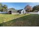 Large backyard, screened patio, picnic table, and playset at 2888 Berkshire Woods Ter, Deltona, FL 32725