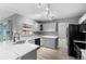Modern kitchen featuring white cabinets and quartz countertops at 2888 Berkshire Woods Ter, Deltona, FL 32725