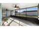 Relaxing screened porch with tiled floor and ceiling fans at 2888 Berkshire Woods Ter, Deltona, FL 32725