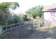 Neatly kept backyard area with a metal fence at 3019 N Covington Dr, Deltona, FL 32738