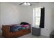 Small bedroom with a twin-size bed and dresser at 3019 N Covington Dr, Deltona, FL 32738