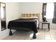 Cozy bedroom with a comfortable bed and nightstand at 3019 N Covington Dr, Deltona, FL 32738