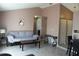 Living room features a gray couch and tile floors at 3019 N Covington Dr, Deltona, FL 32738