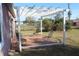 Relaxing patio area with pergola and metal chairs at 3019 N Covington Dr, Deltona, FL 32738