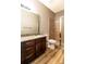 Bathroom boasts a large shower and granite countertops at 304 Gardenia Ave, Debary, FL 32713