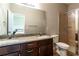 Double vanity bathroom with granite countertops and shower at 304 Gardenia Ave, Debary, FL 32713