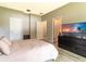 Main bedroom with ensuite bathroom and ample closet space at 304 Gardenia Ave, Debary, FL 32713