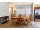 Casual dining area with wood table and chairs, situated near kitchen at 304 Gardenia Ave, Debary, FL 32713